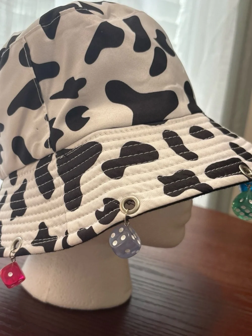 Black & White Cow Print Bucket Hat with Colorful Dice Charms